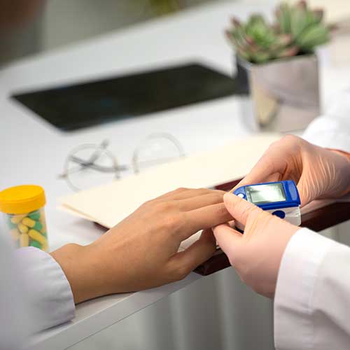 Endocrinologist discussing diabetes treatment plan with patient.